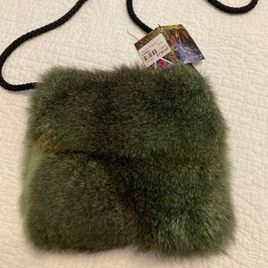 Purchased new in New Zealand for $110.00
Colored Possum Handbag 8x7”